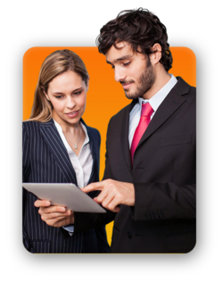 Two colleagues looking at a laptop